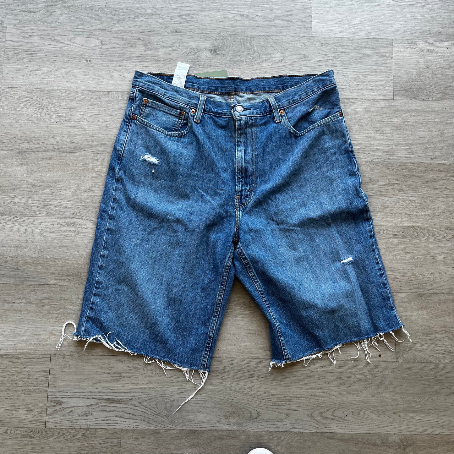 Vintage Levi’s Light Blue Distressed Shorts