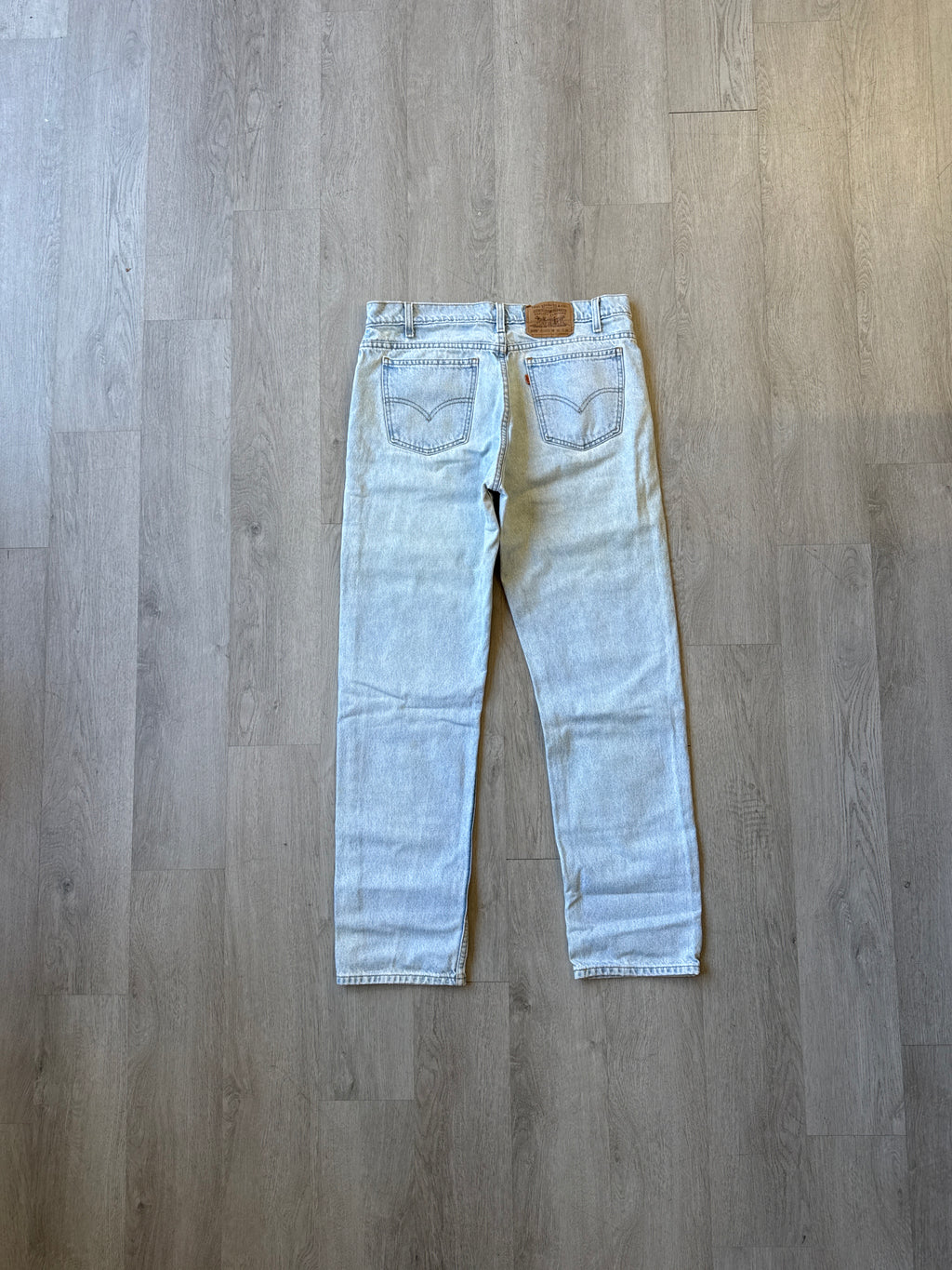 Vintage Levi’s 550 Orange Tab Relaxed Tapered Light Washed Denim Jeans