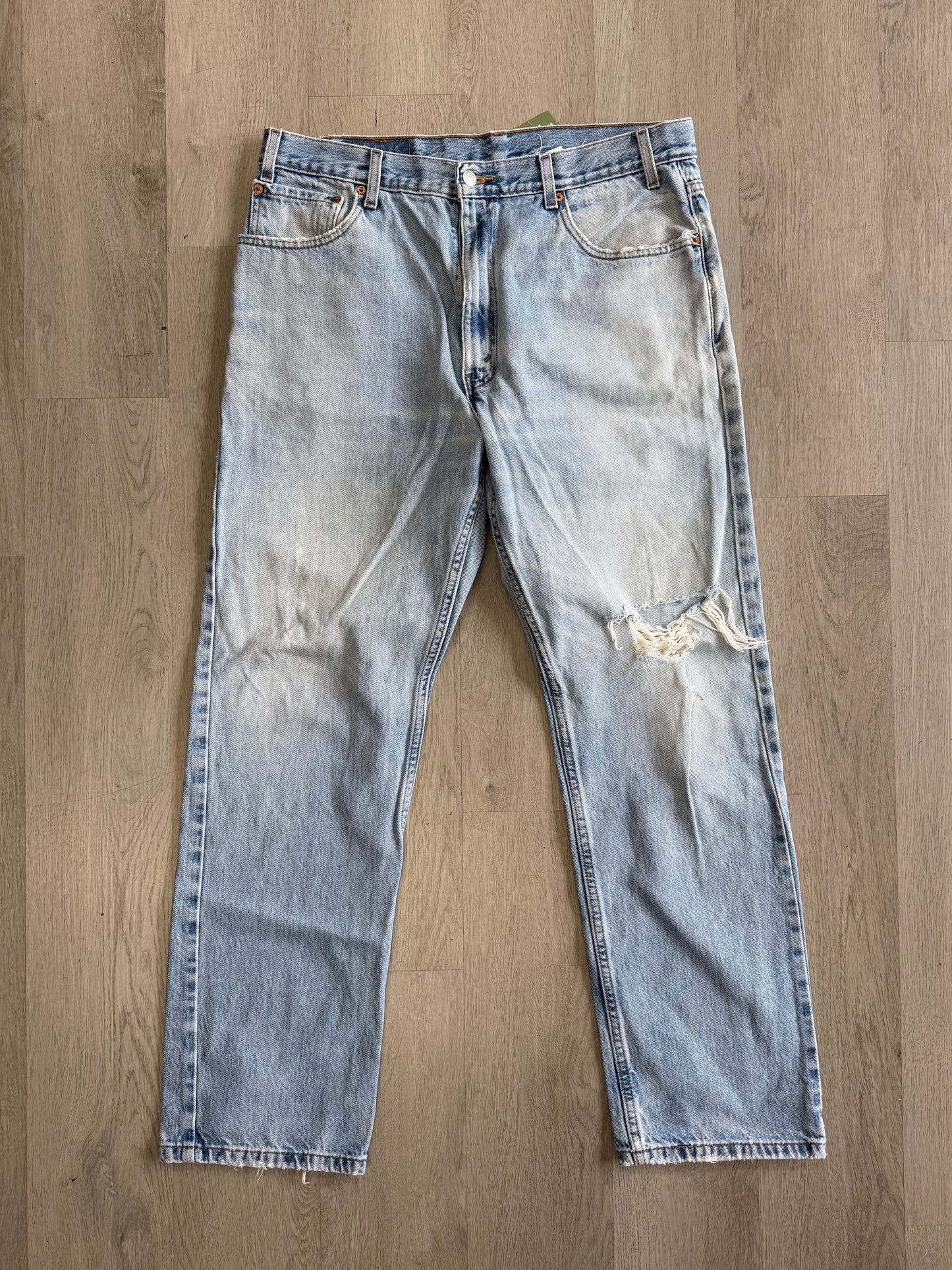 Levi’s 505 Distressed Knee Jeans