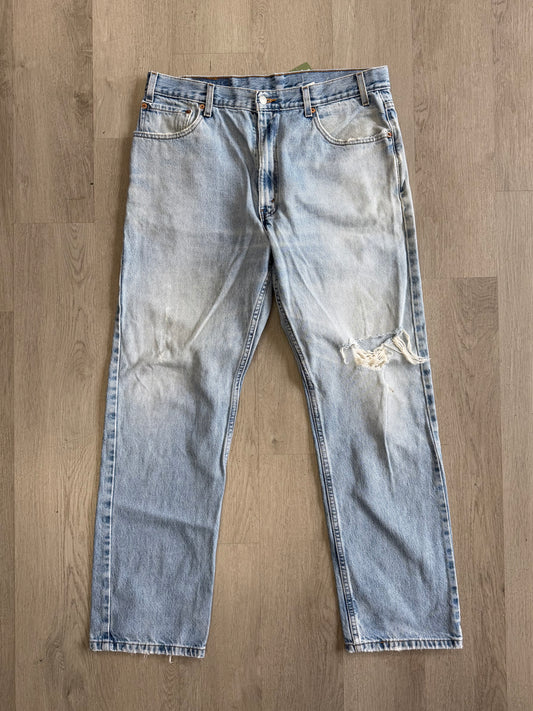 Levi’s 505 Distressed Knee Jeans
