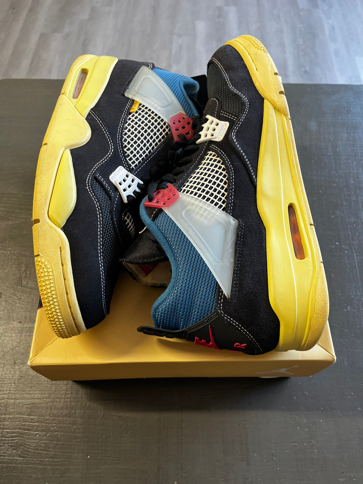 Pre Owned Nike Air Jordan 4 Retro x Union LA 'Off Noir Sneakers