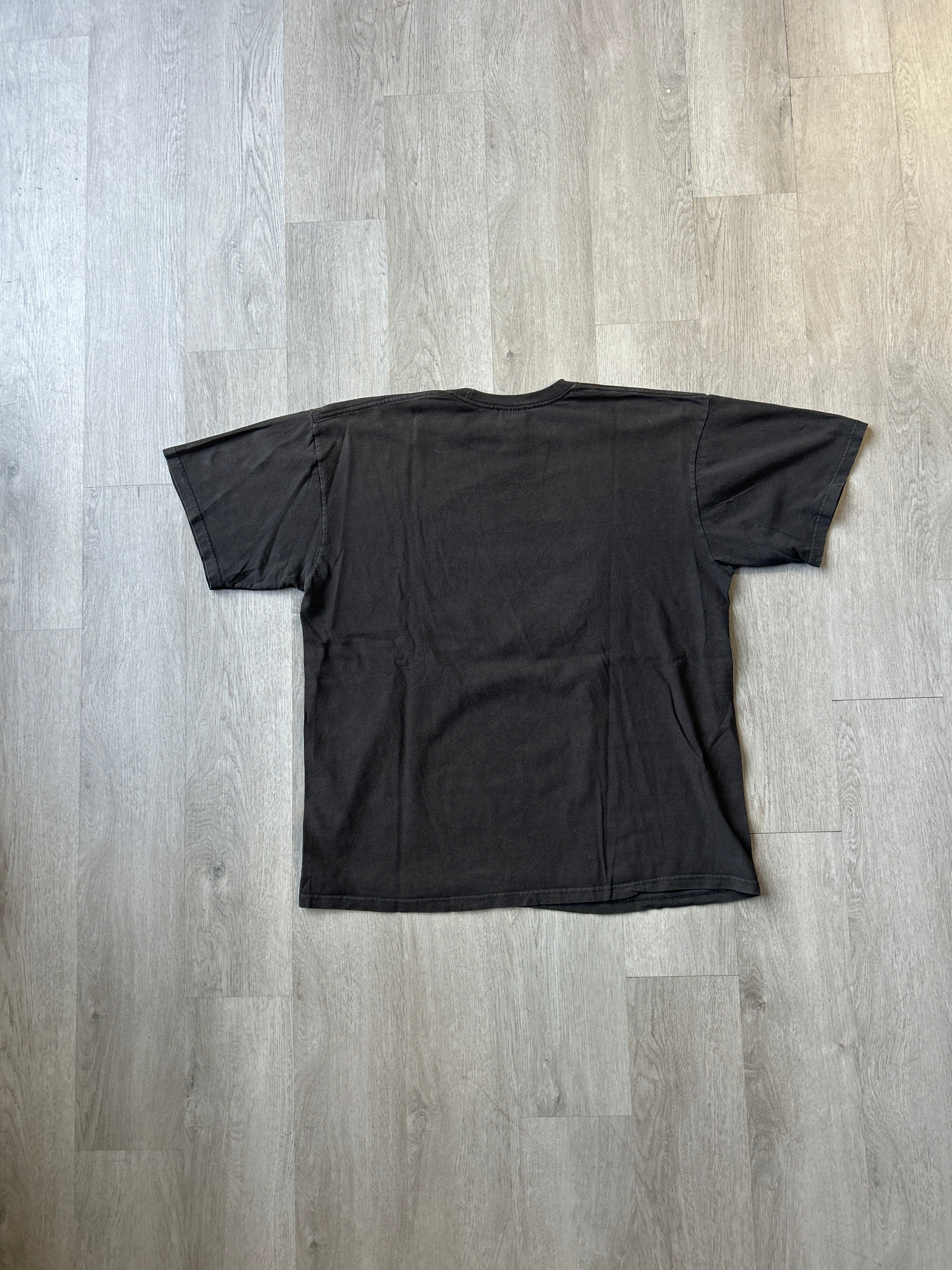 Vintage Stussy Global Roots Skull Tee