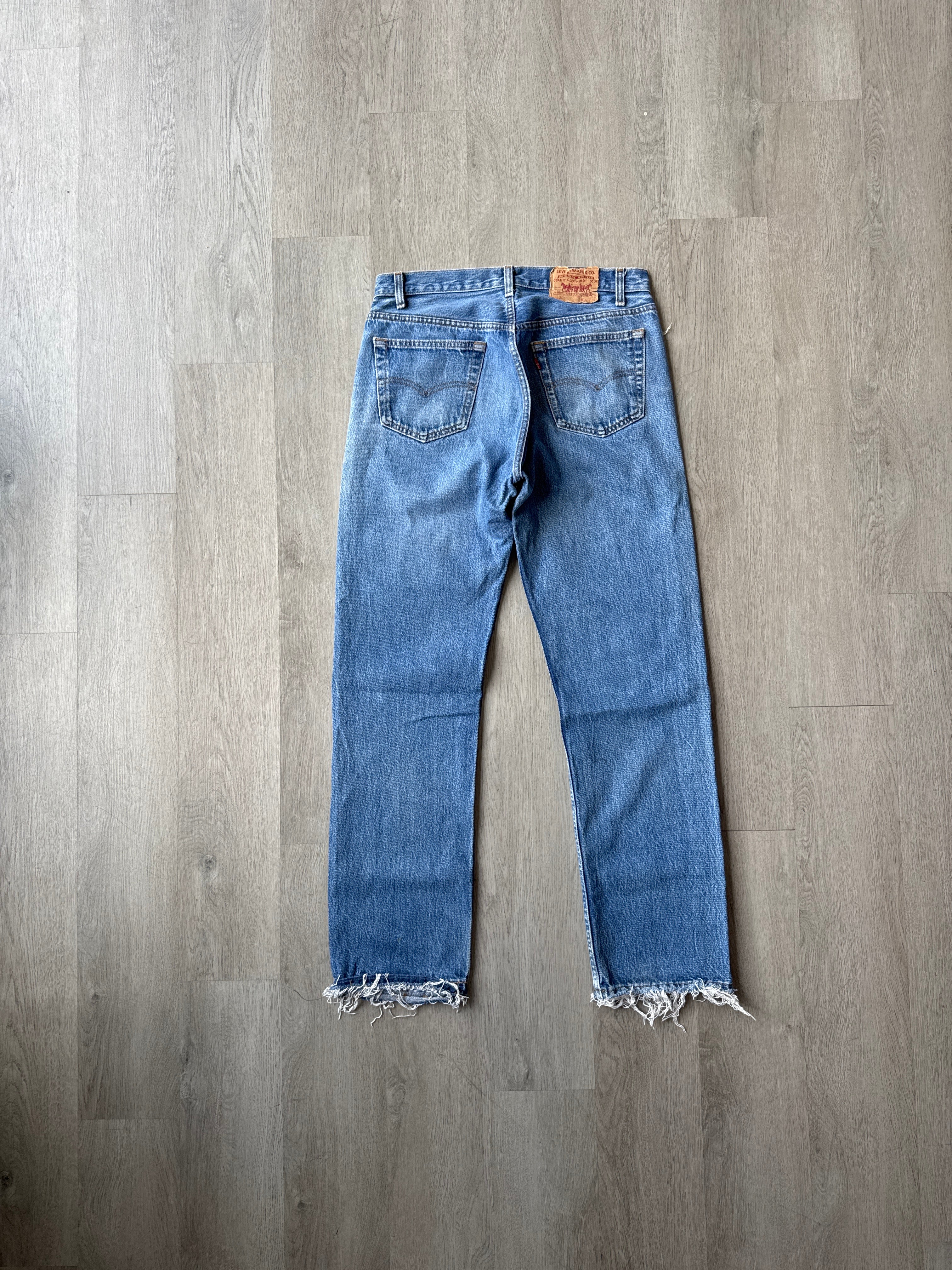 Vintage Levi’s 501 Distressed Denim Jeans