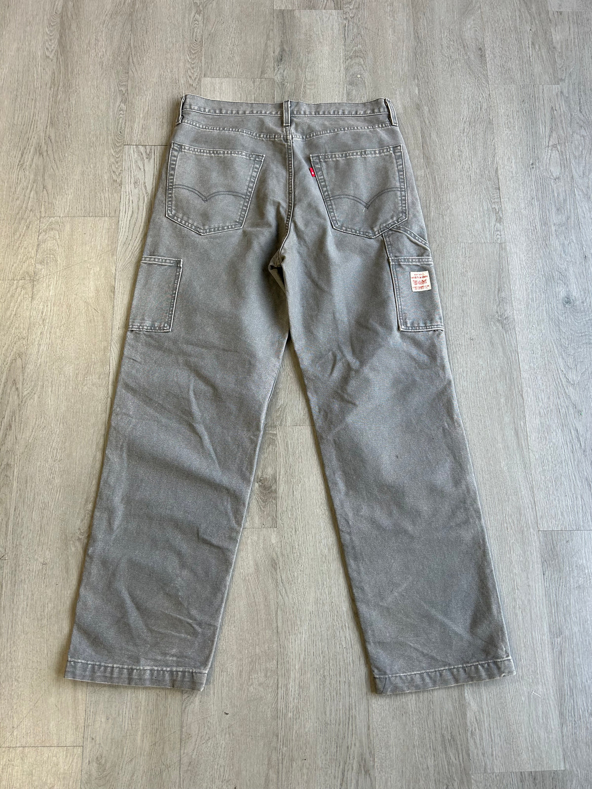 Faded Grey Levi’s Double Knees