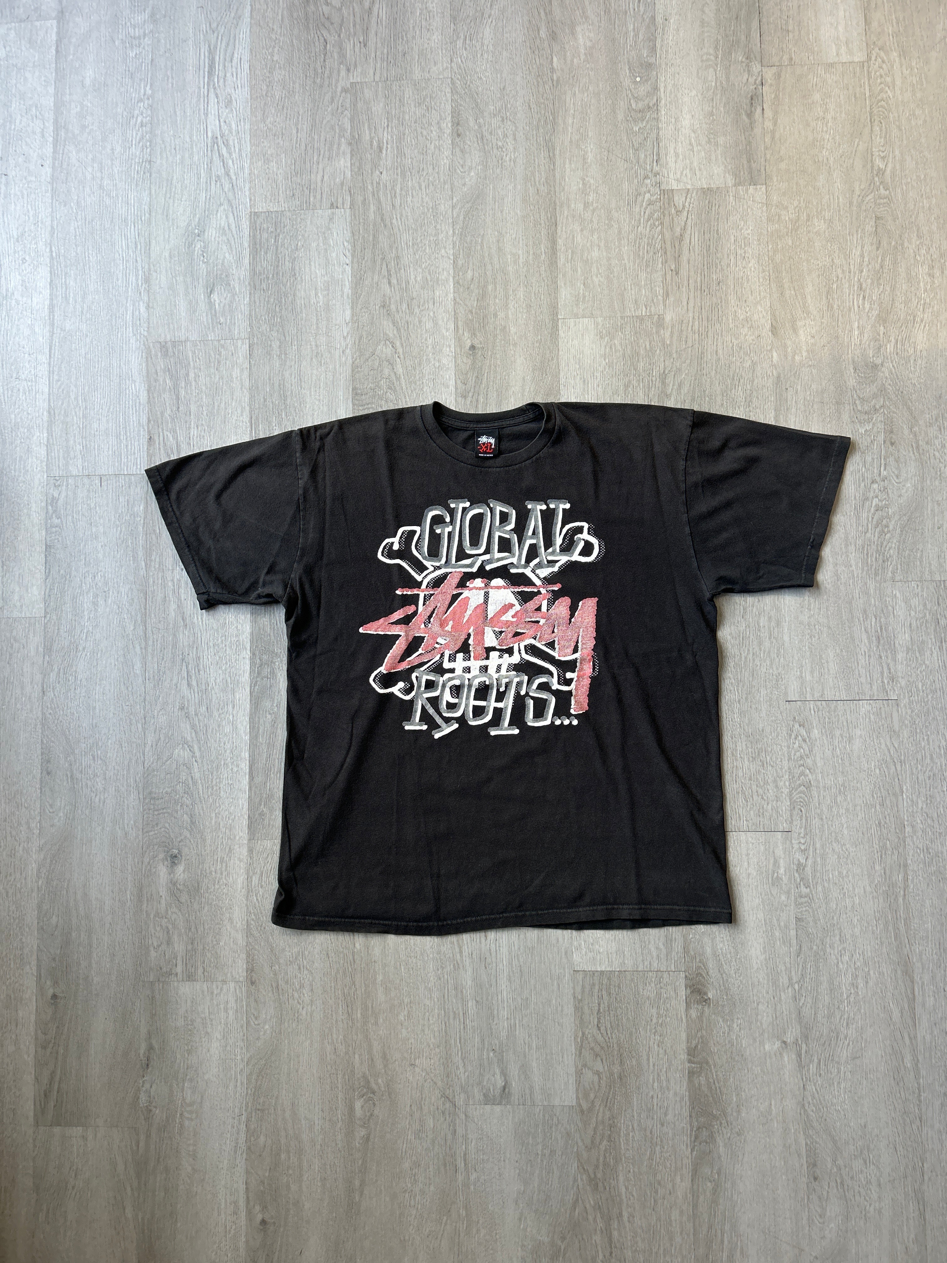 Vintage Stussy Global Roots Skull Tee