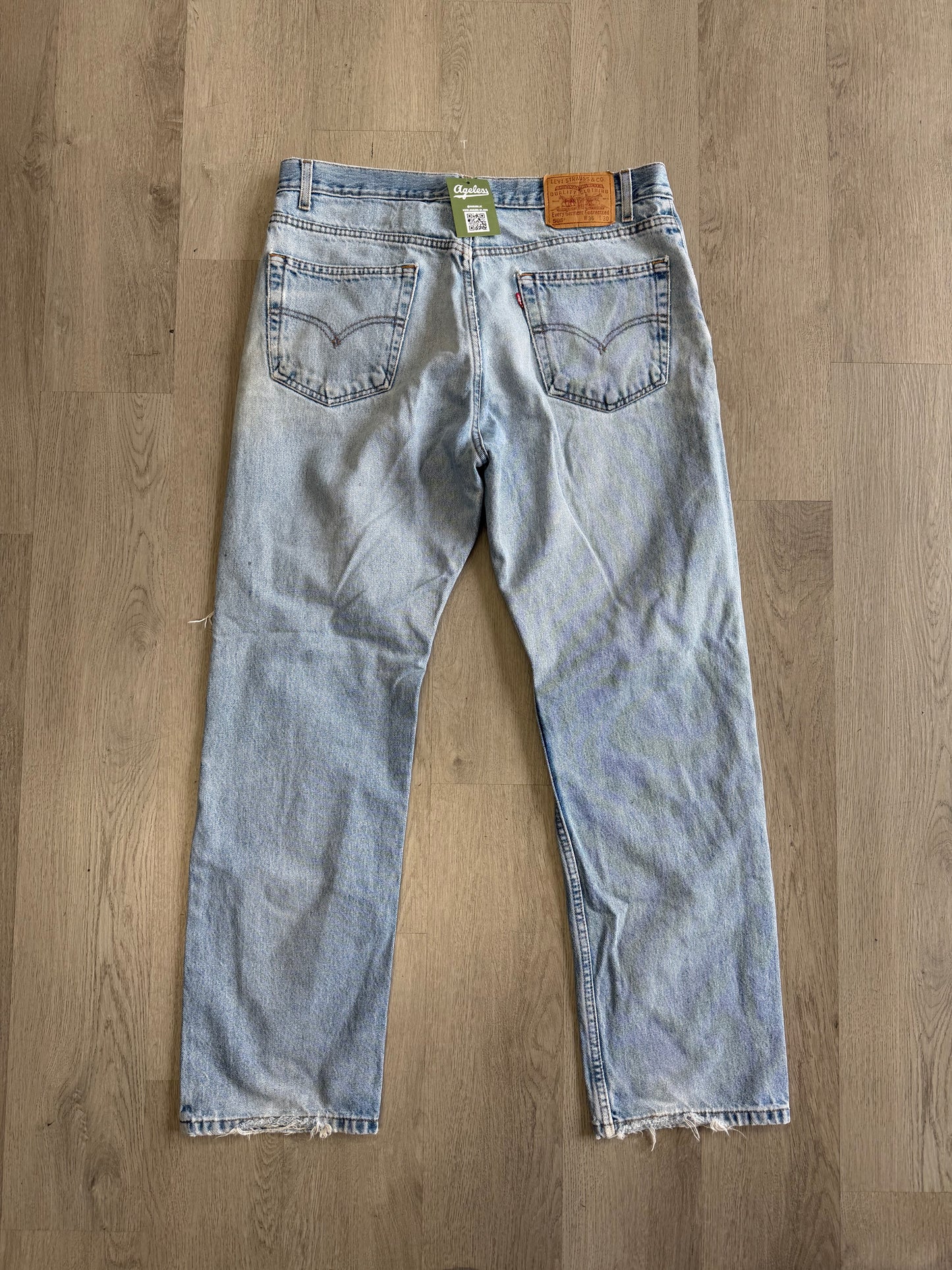 Levi’s 505 Distressed Knee Jeans