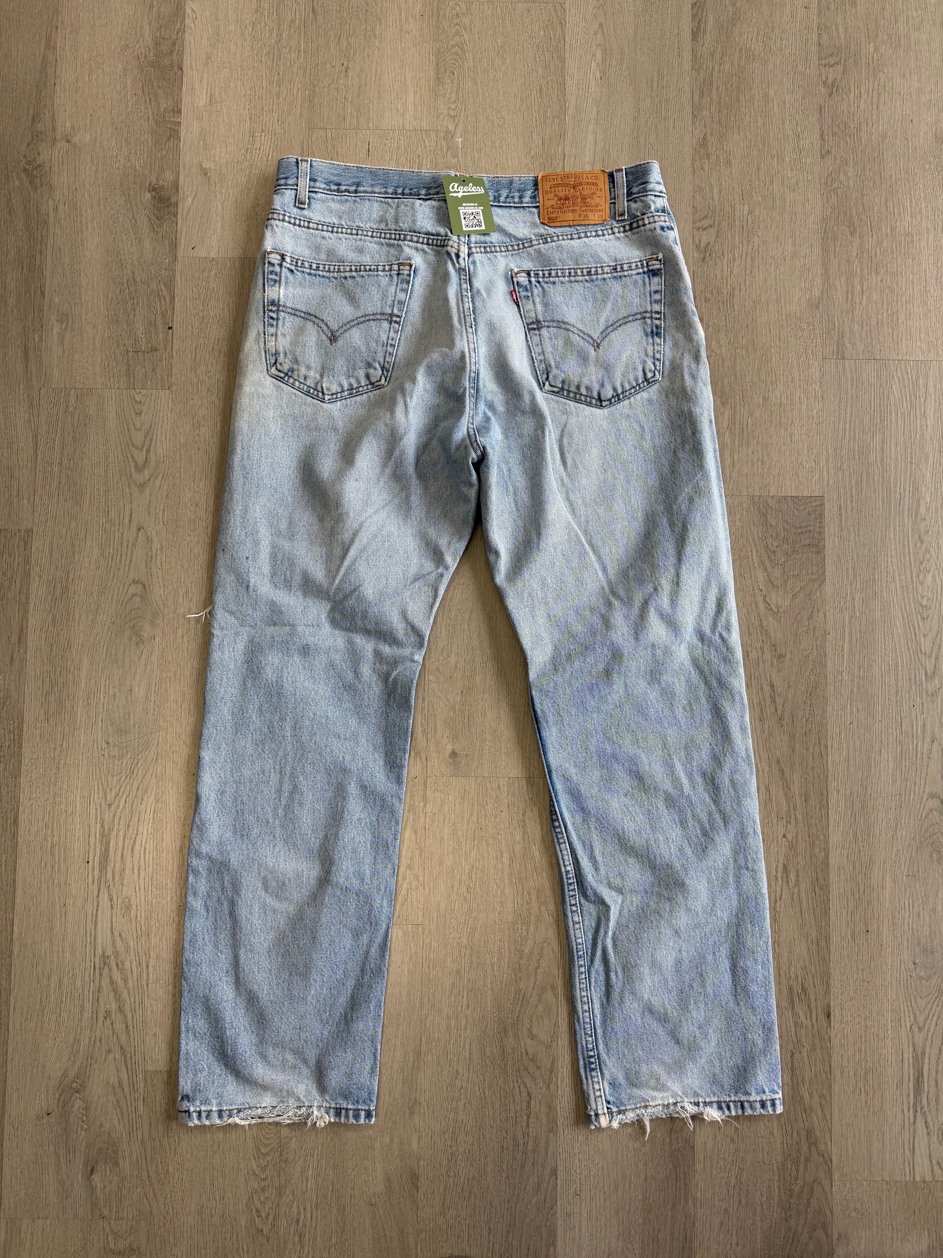 Levi’s 505 Distressed Knee Jeans