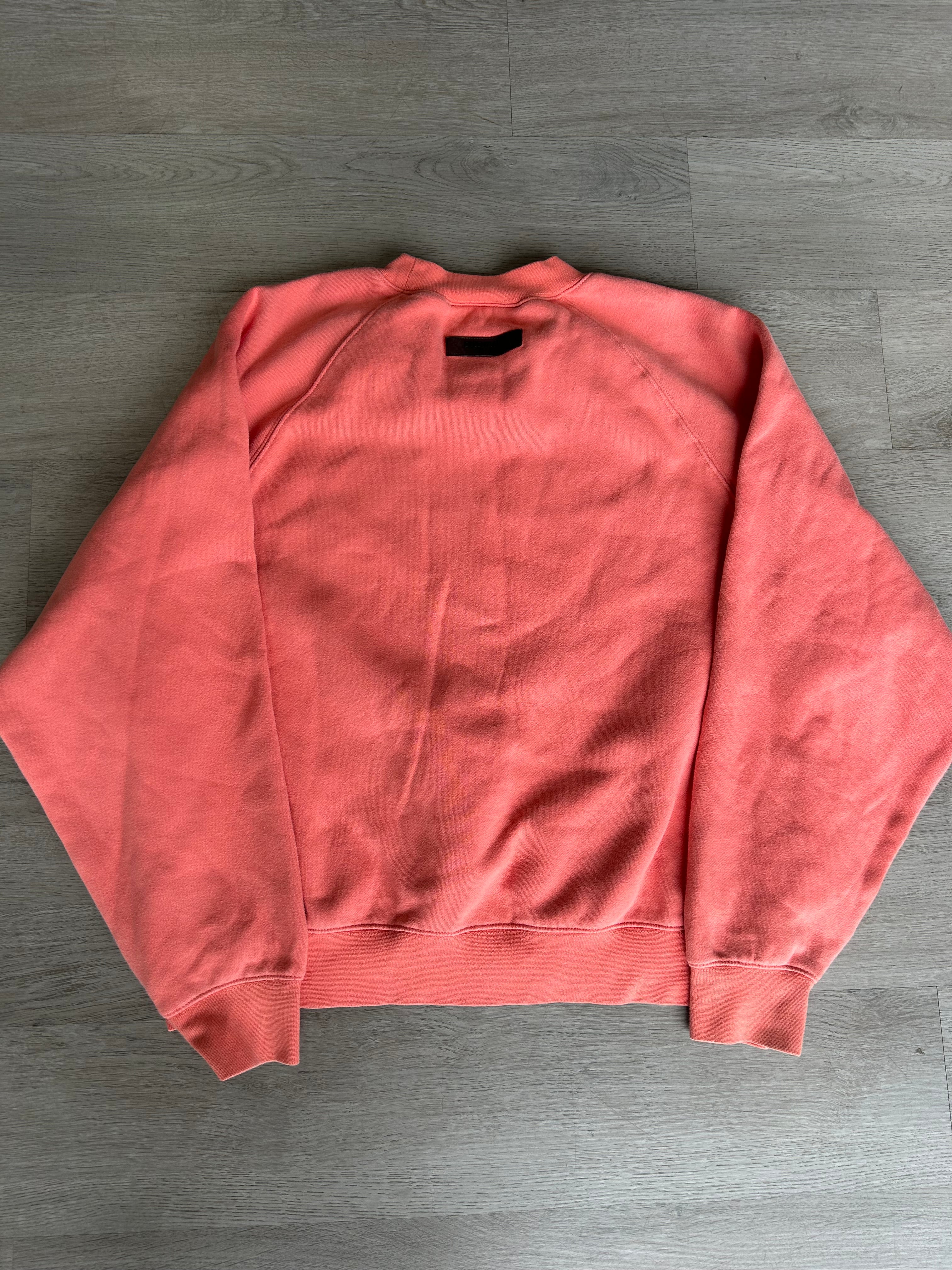 Peach Fear of God Essentials crewneck sweatshirt