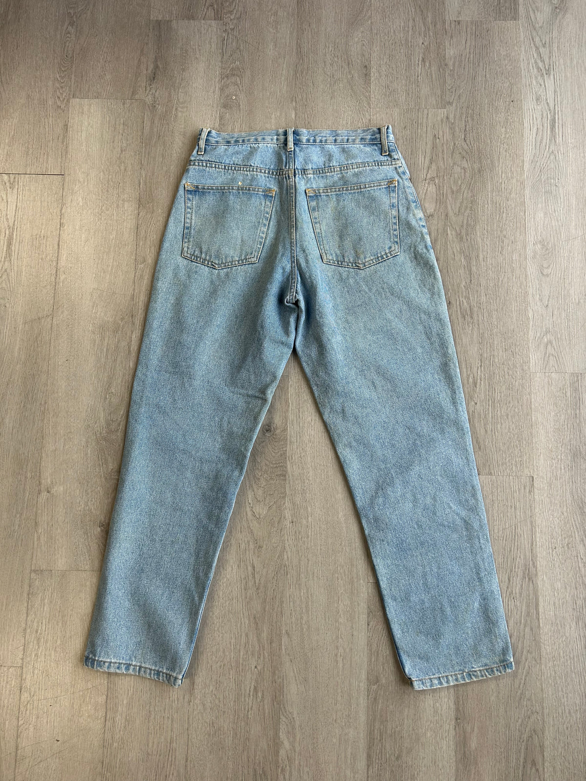 Vintage Light Wash Distressed & Patched Denim Jeans