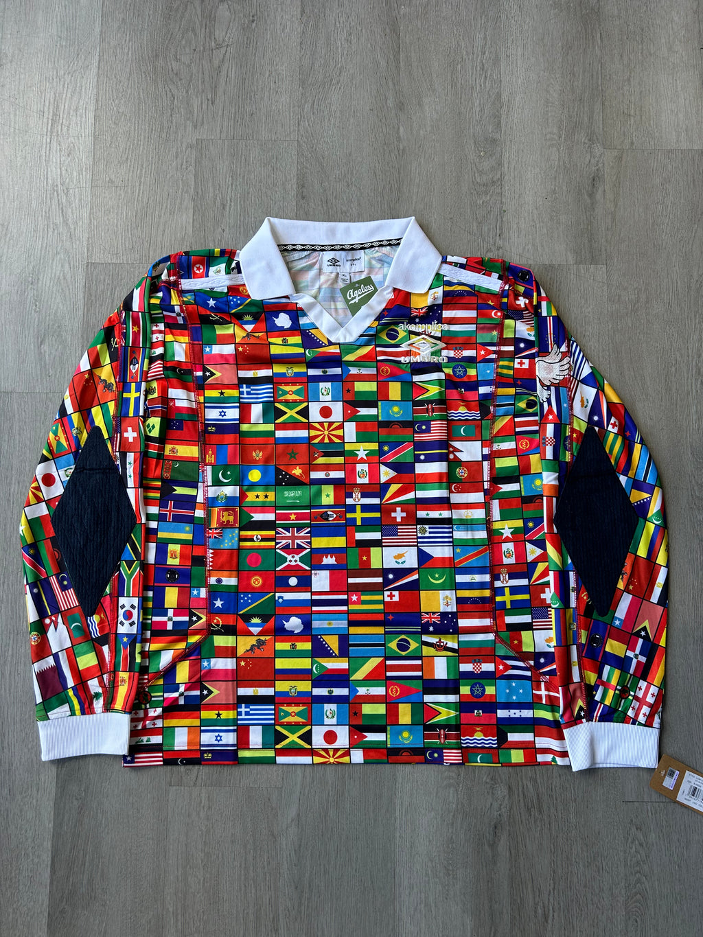 Akomplice x Umbro "World Peace" Flag Jersey