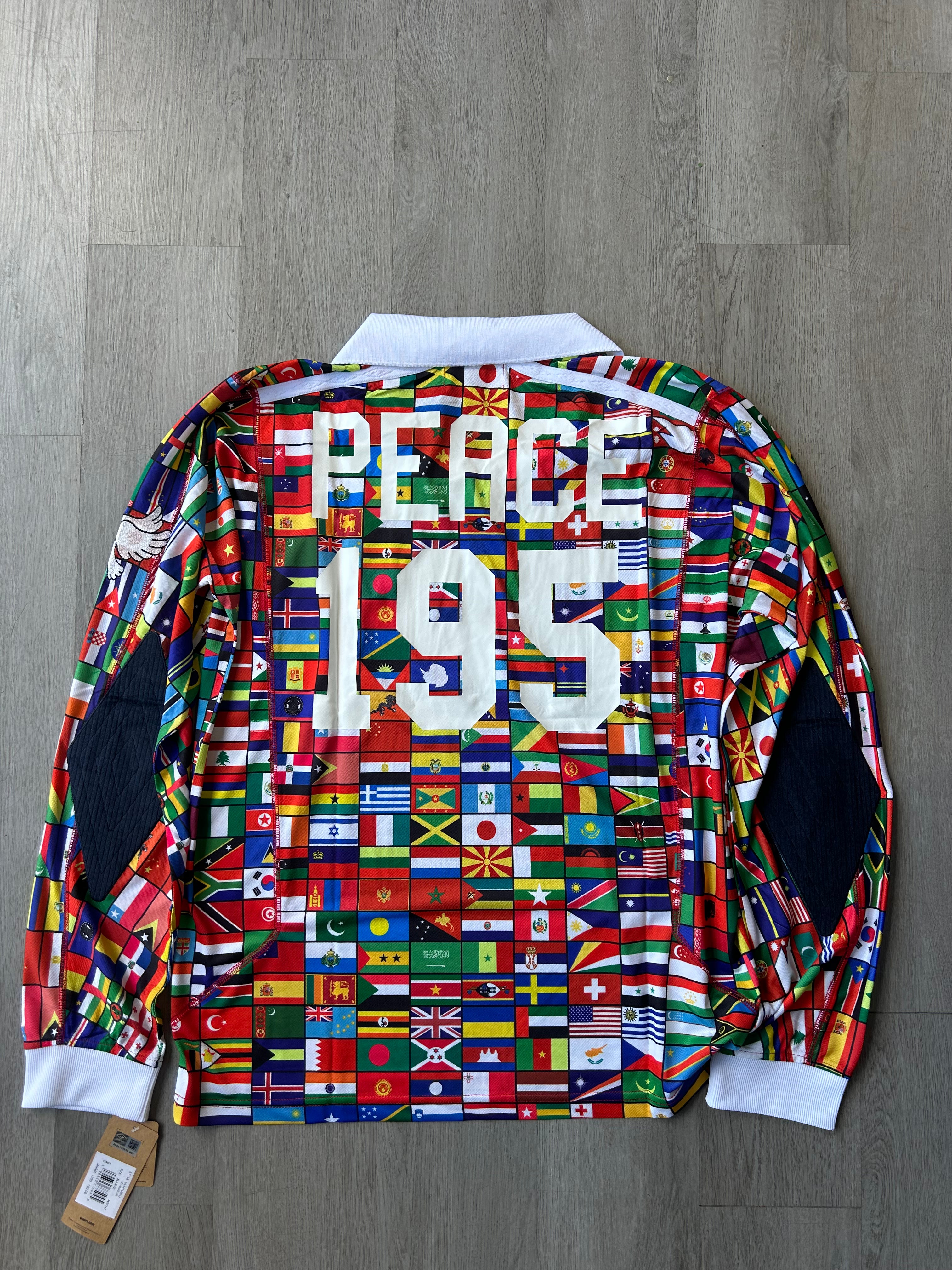 Akomplice x Umbro "World Peace" Flag Jersey